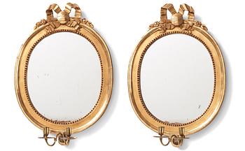 80. A pair of Gustavian girandole mirrors by J Åkerblad (master in Stockholm 1756-1799).