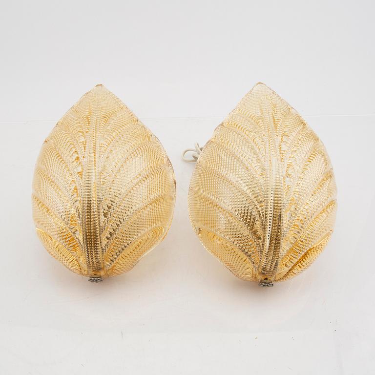 A pair of Possibly Orrefors glass wall scones mid 1900s.