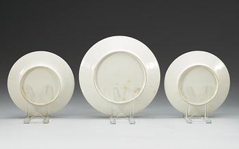 A set of 12 French small dishes and a plate, Empire.