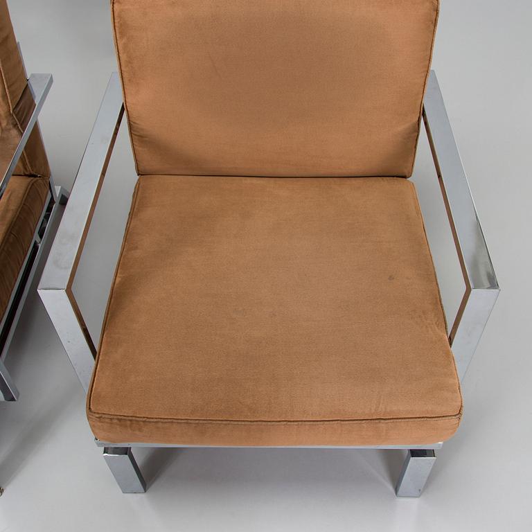 A pair of  21st century armchairs for Innovation.