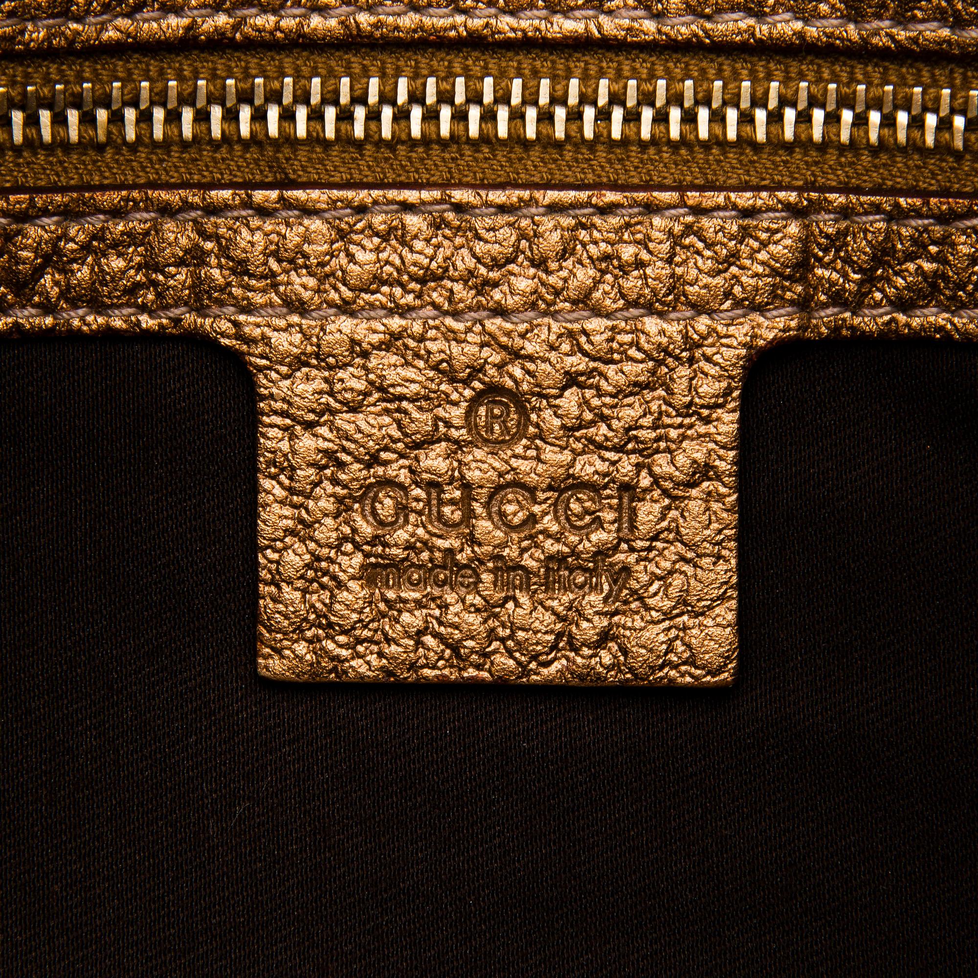 A Gold Leather Hasler Horsebit Hobo Bag.