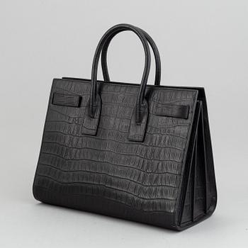 Yves Saint Laurent, a crocodile embossed 'Sac de Jour' leather handbag.
