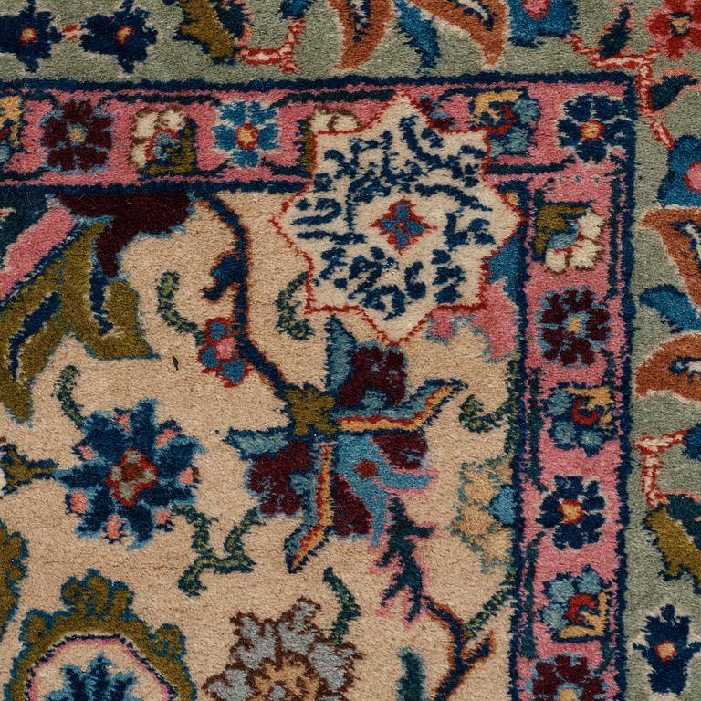 A RUG, a semi-antique Tabriz, ca 198 x 142 cm.