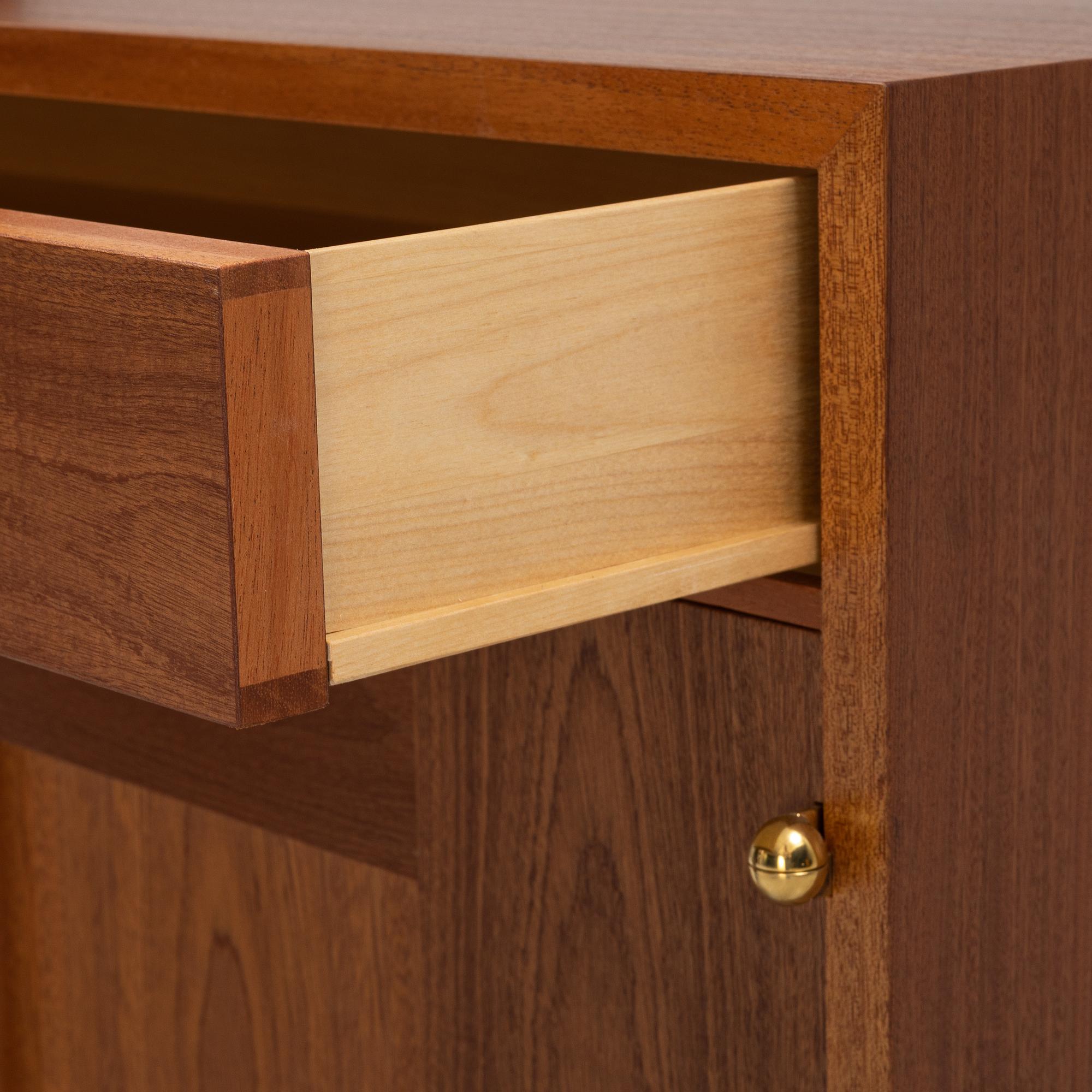Josef Frank, a mahogany book case with vitrine and cabinet, Firma Svenskt Tenn.