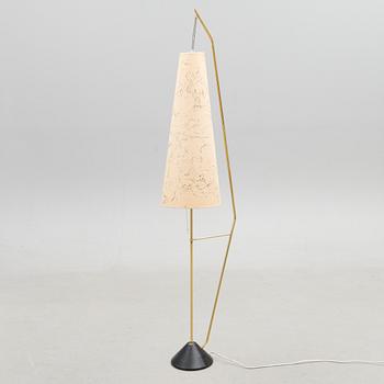 A mid-20th Century floor lamp.