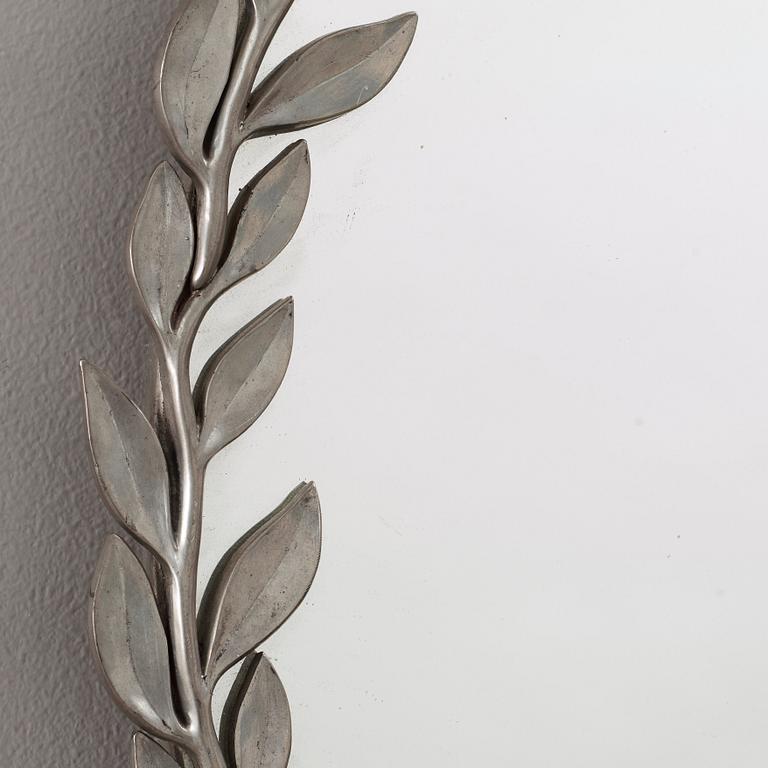 Estrid Ericson, a pewter mirror, Svenskt Tenn, Stockholm 1955.