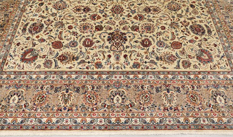 A carpet, old Keshan, approx. 418 x 314 cm.