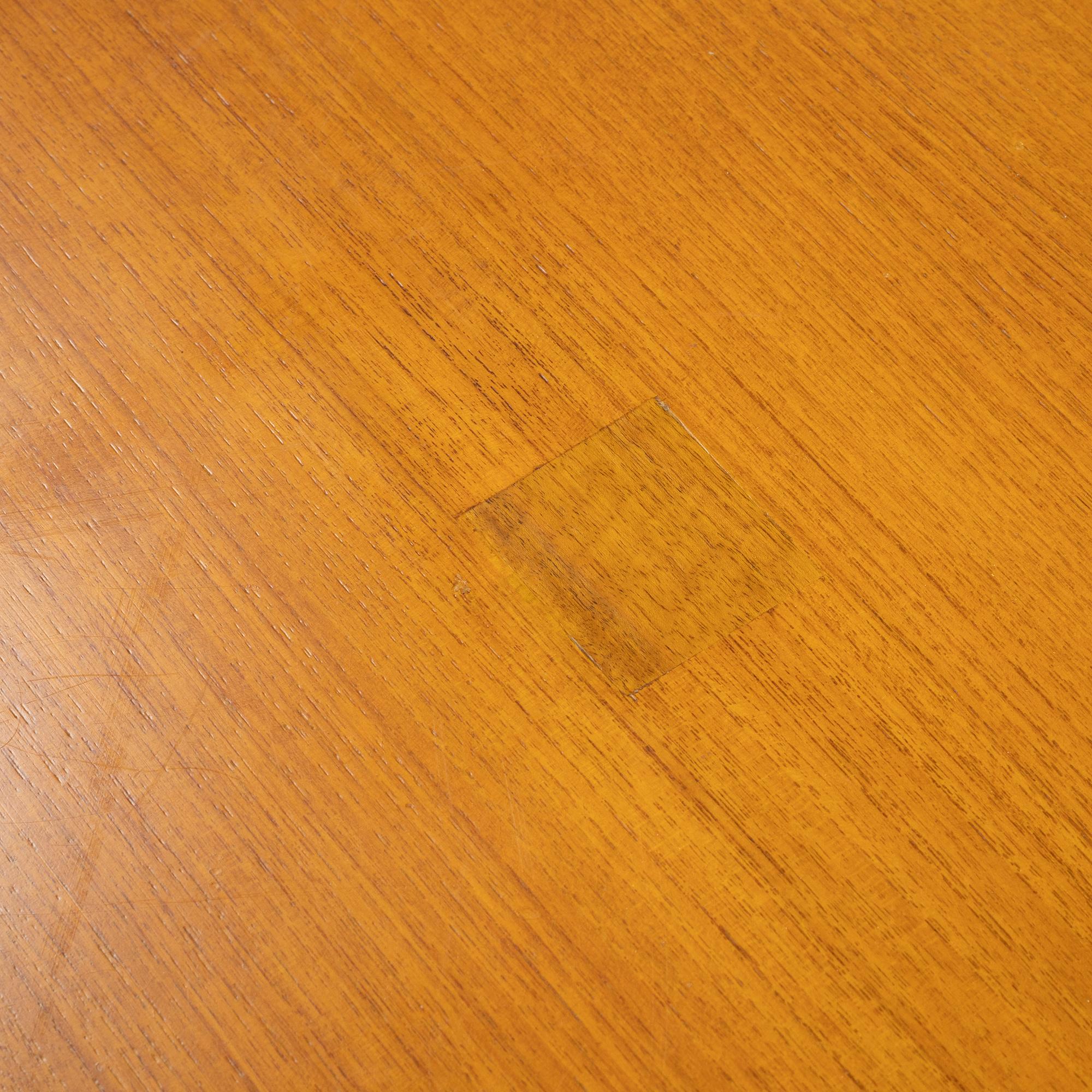 Hans J Wegner, a model 'AT-312' teak veneered dining table, Andreas Tuck, Denmark.