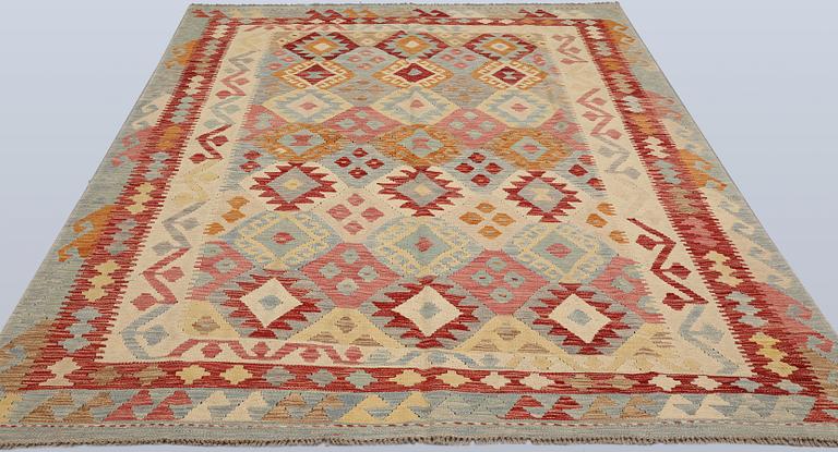 A Kilim rug, approx. 247 x 191 cm.