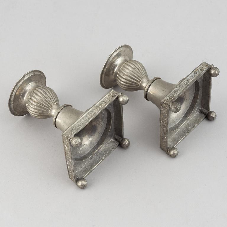 A pair of pewter candlesticks by Niclas Anström, Växjö 1835.