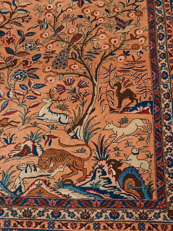A carpet, a semi-antique Kashan, a so called Dabir, ca 383,5-387,5 x 269,5-275 cm.