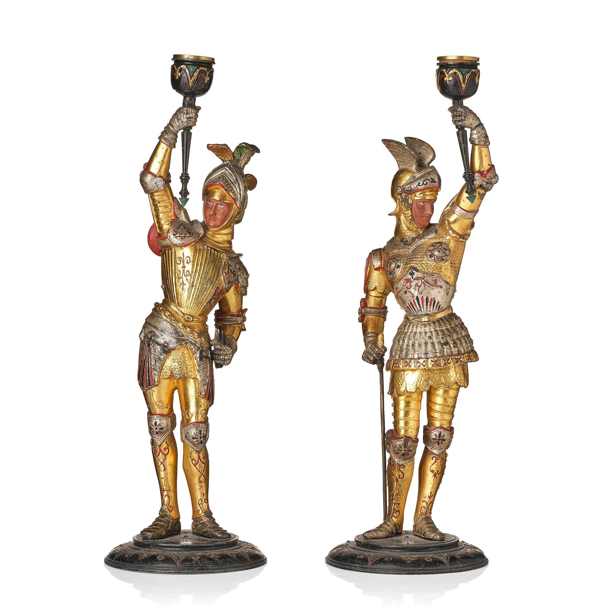 A pair of presumably German knights candlesticks, secound half 19th century.