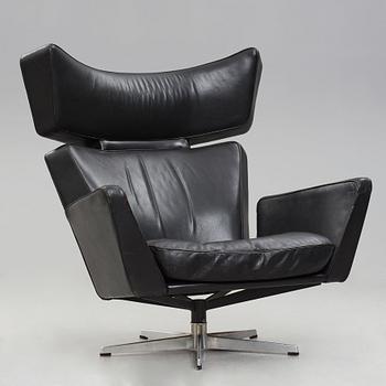 Arne Jacobsen, a black leather and aluminium "Ox-Chair", Denmark 1966.