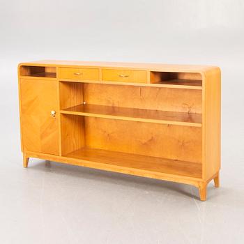A 1940s birch book shelf.