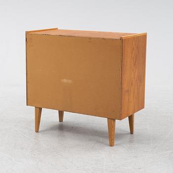 A teak veneered chest of drawers, Häggeryda Möbelfabrik, Nilsson & Co, Glimåkra, 1950's/60's.