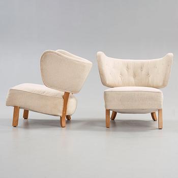 A pair of Nordic 1930's upholstered easy chairs, probably Denmark.