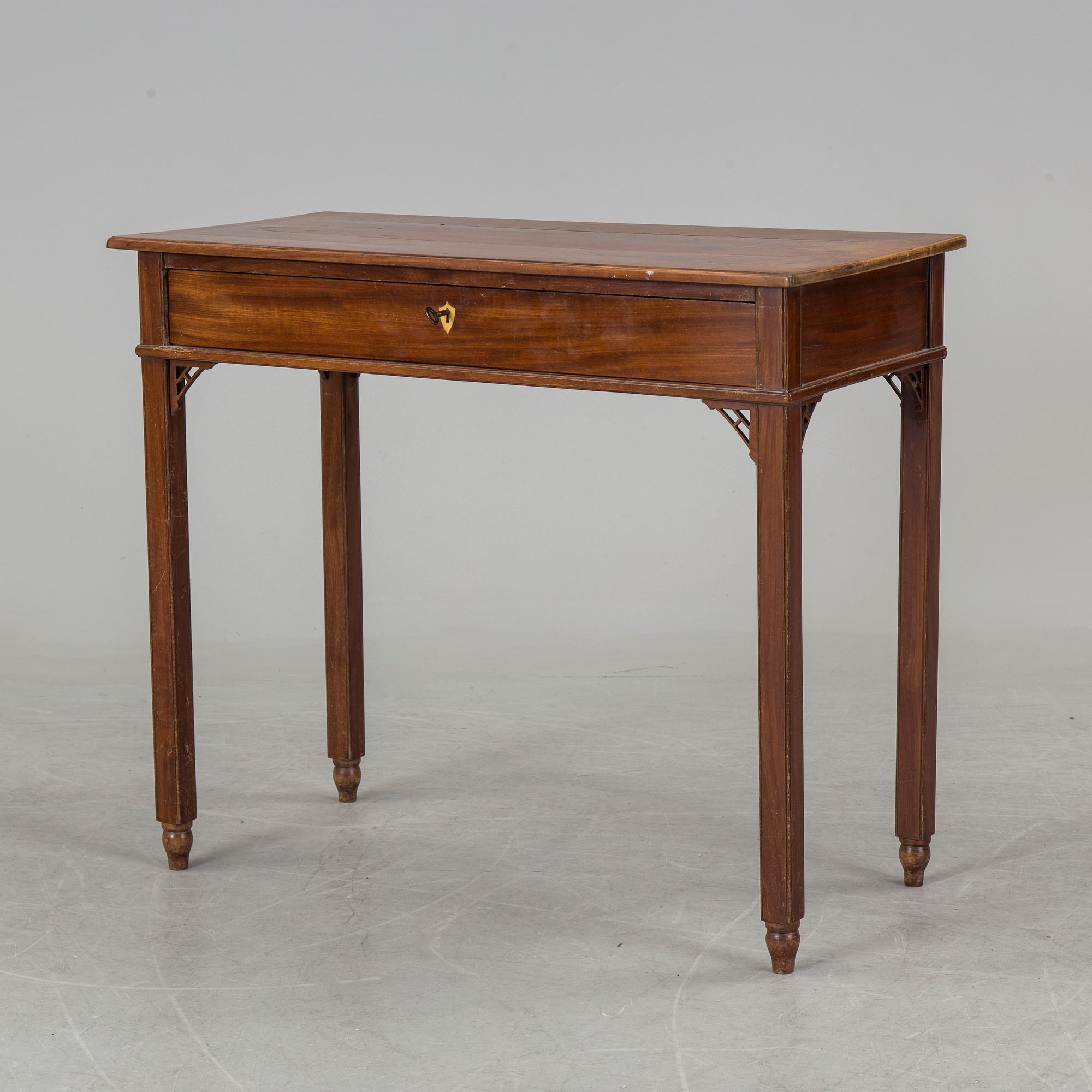 In the manner of the artist, a early 19th century late Gustavian table veneered with mahogany.