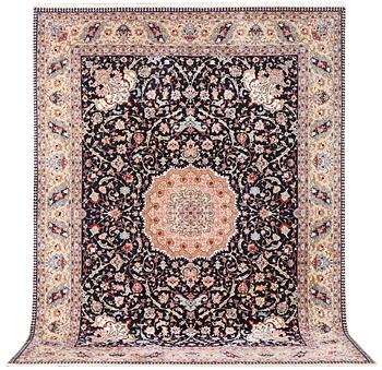 A semi.antique Tabriz carpet, 50 raj, c. 390 x 290 cm.