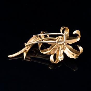 BROSCH, fasettslipade rubiner och safirer, 18K guld. Frankrike.
