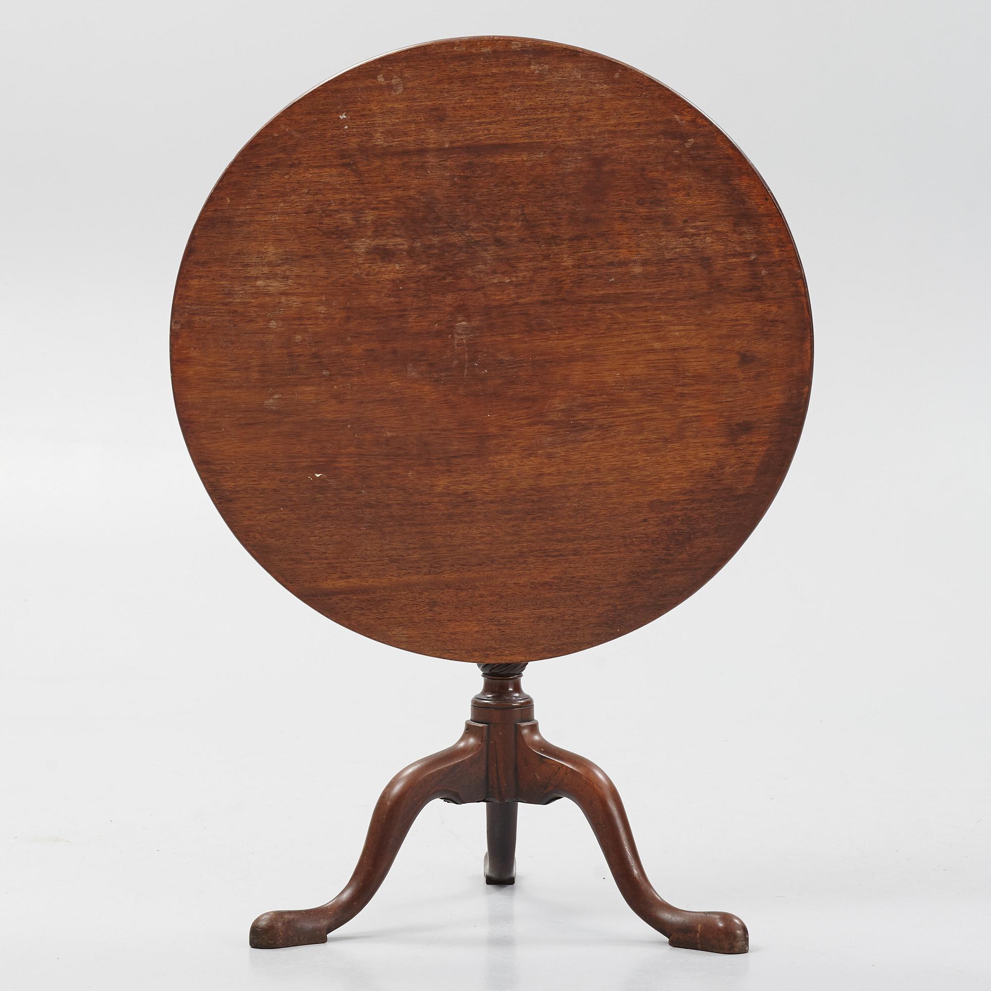 A mahogany fording table, 19th Century.