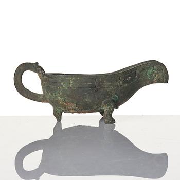 A Chinese brushpot, Qing dynasty, circa 1900. An archaistic bronze ewer and a silvered South East Asian bowl with stand.