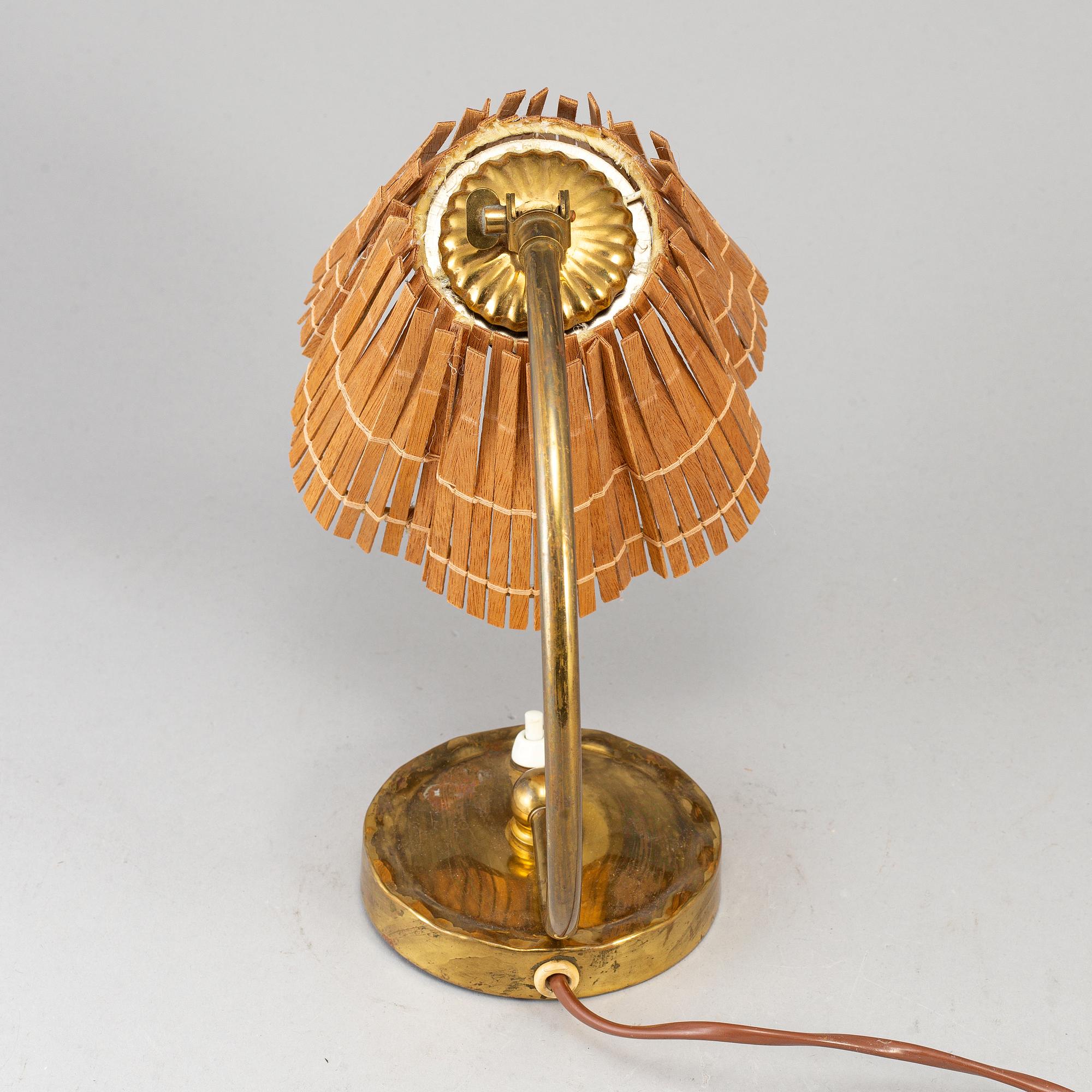 PAAVO TYNELL, a model 61032 table light from Idman, Finland.