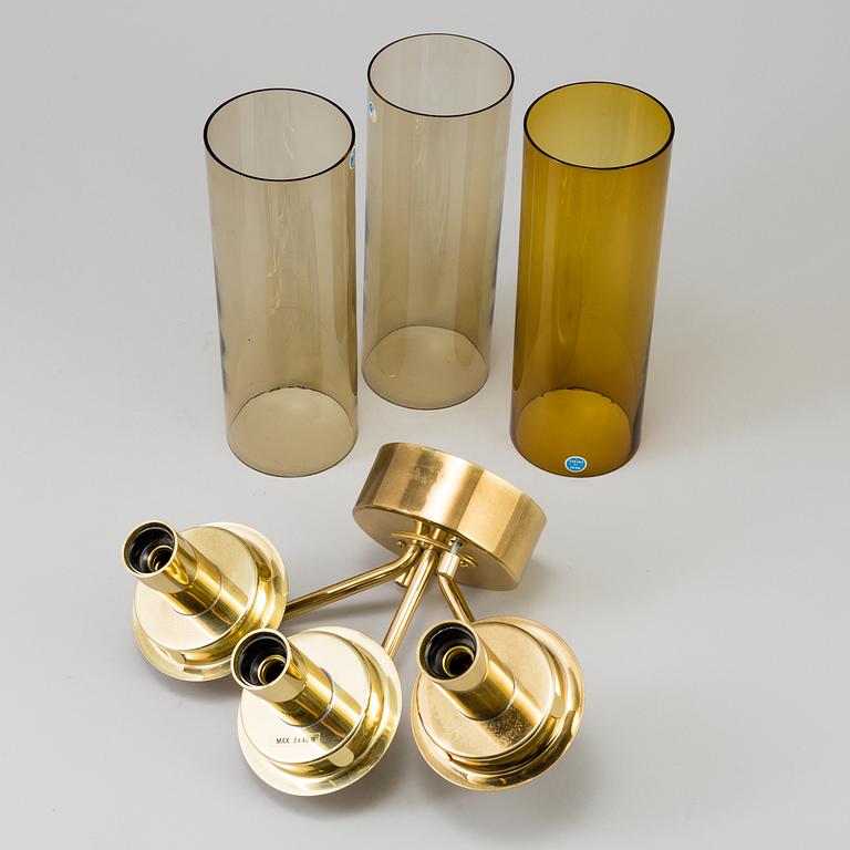 A brass wall lamp by HANS-AGNE JAKOBSSON, Markaryd.