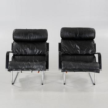 A pair of "Remmi 817H-1K" chairs, designed by Yrjö Kukkapuro in 1969, made by Haimi Oy or Avarte Oy.