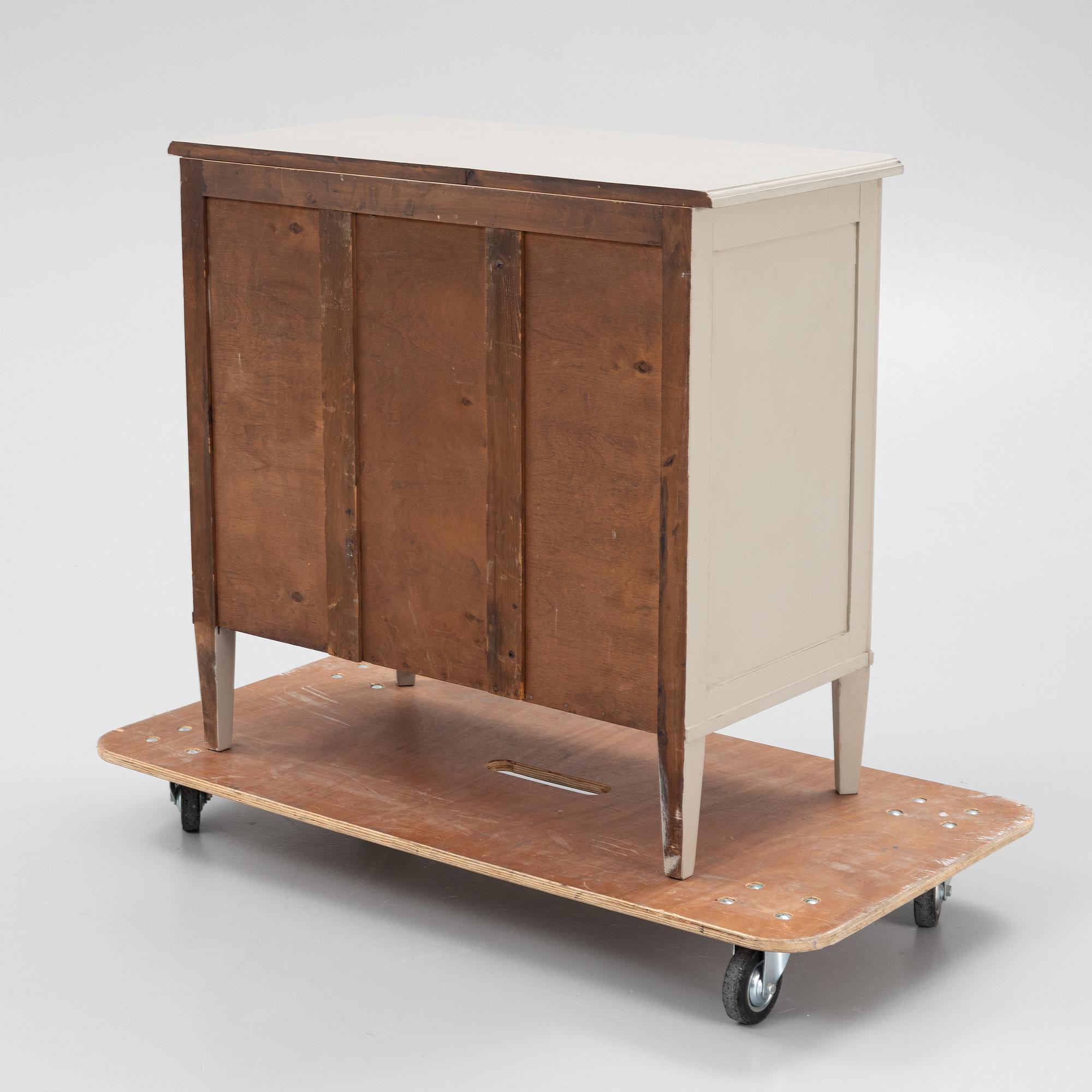 A Gustavian style chest of drawers, early 20th century.