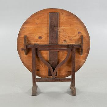 A folding table, a so called wine testing table from the early 20th century.