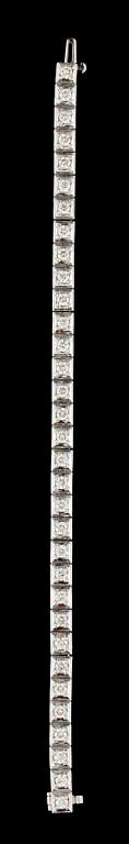 A white gold and diamond bracelet.