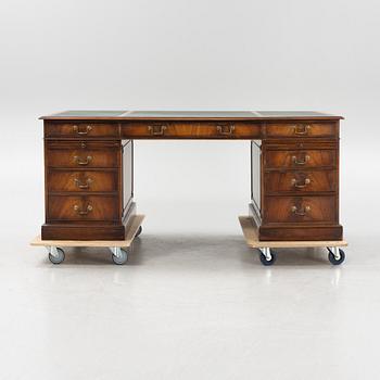 A 20th century Bevan Funnell Ltd Reprodux desk, England.