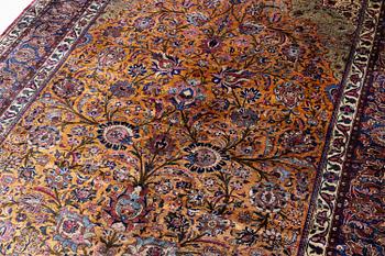 An antique silk Kashan carpet, central Persia (Iran), c. 314 x 210 cm.