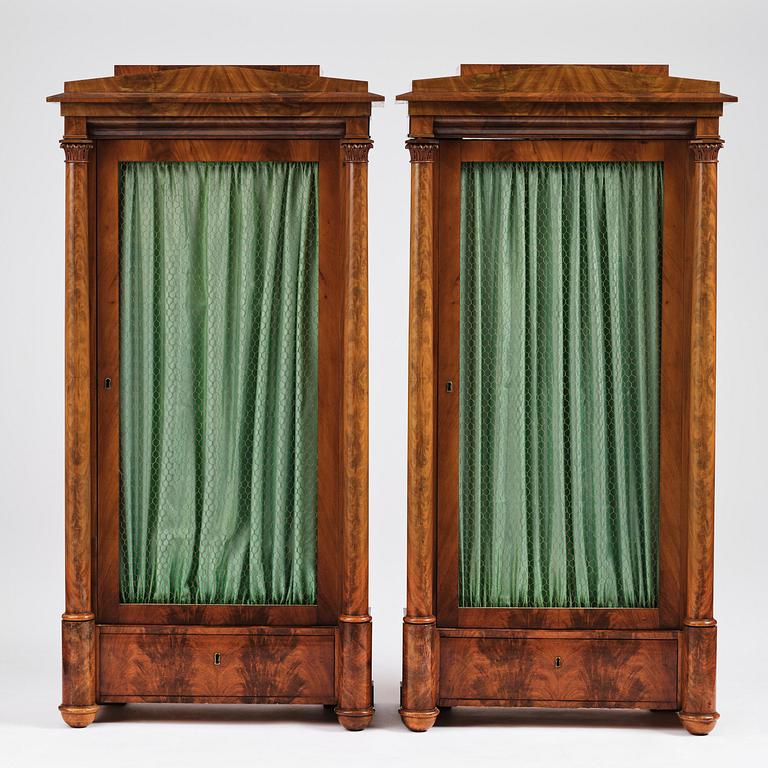 A pair of Swedish Empire mahogany bibliothèques, Stockholm, early 18th century.