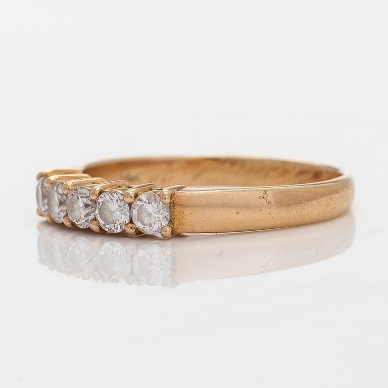 Sormus, 14K kultaa, ja briljanttihiottuja timantteja.Suomalaiset tuontileimat 1989.