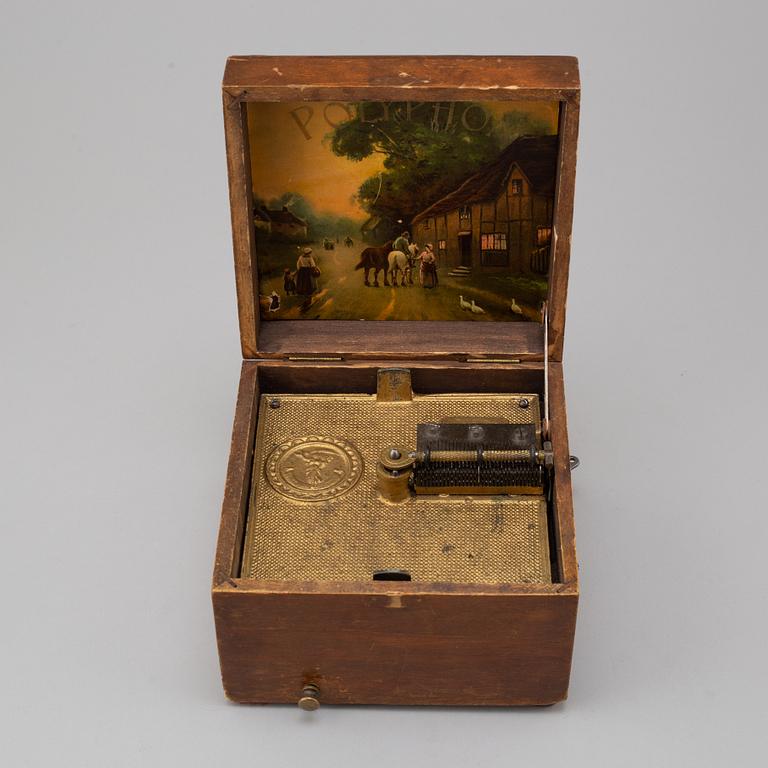 Polyphon wooden music box with fifteen discs, Germany, c. 1900.