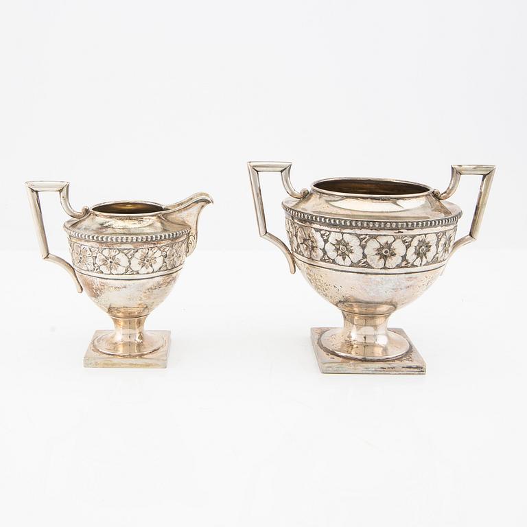 A 2 pcs silver sugar-bowl and creamer mark of A Nilsson Lund 1917, weight 460 grams.