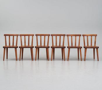 Axel Einar Hjorth, a set of six stained pine 'Utö' chairs, Nordiska Kompaniet, Sweden 1930s.