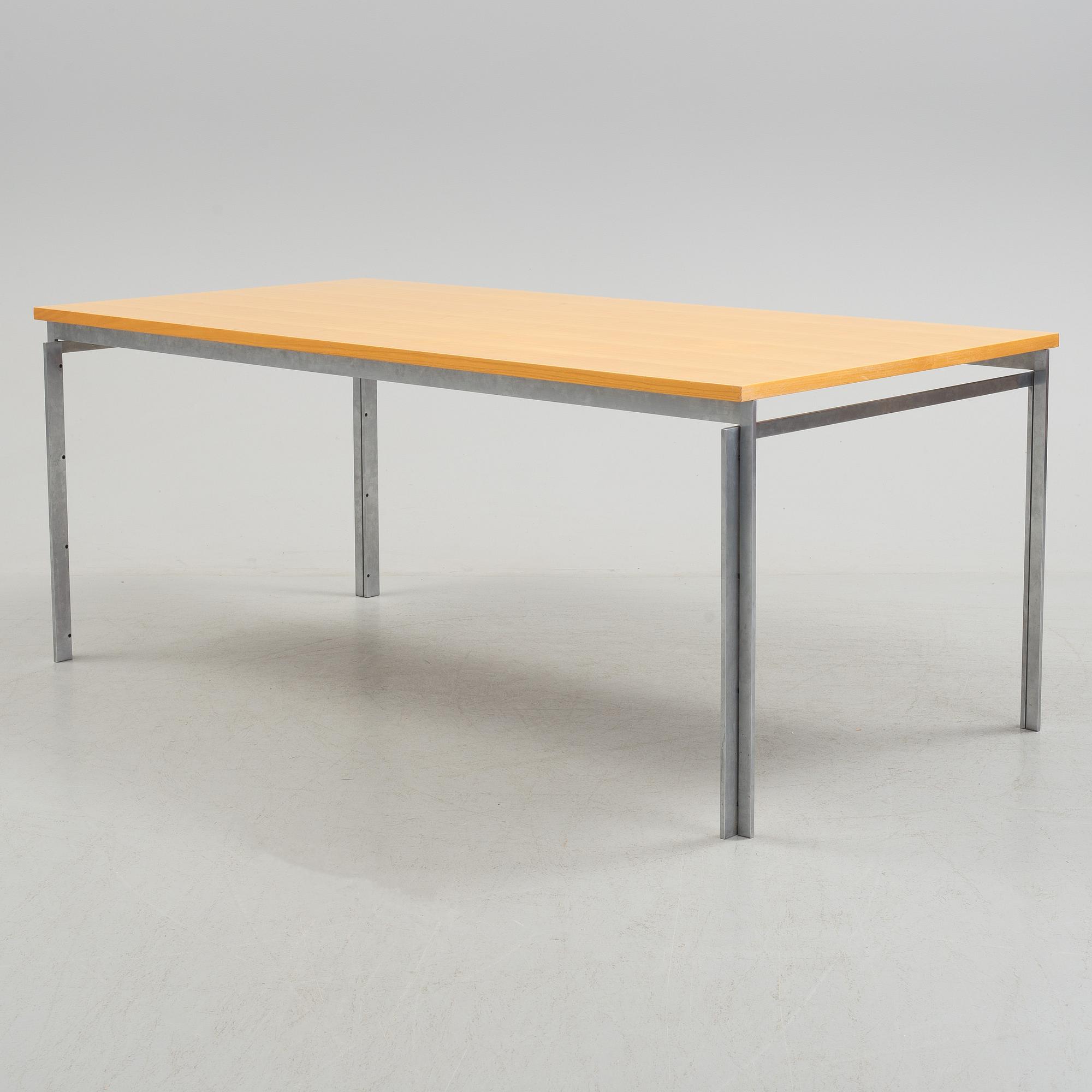 A Poul Kjaerholm "PK-55" table from Fritz Hansen, Denmark.
