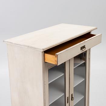 Display cabinet, early 20th century.