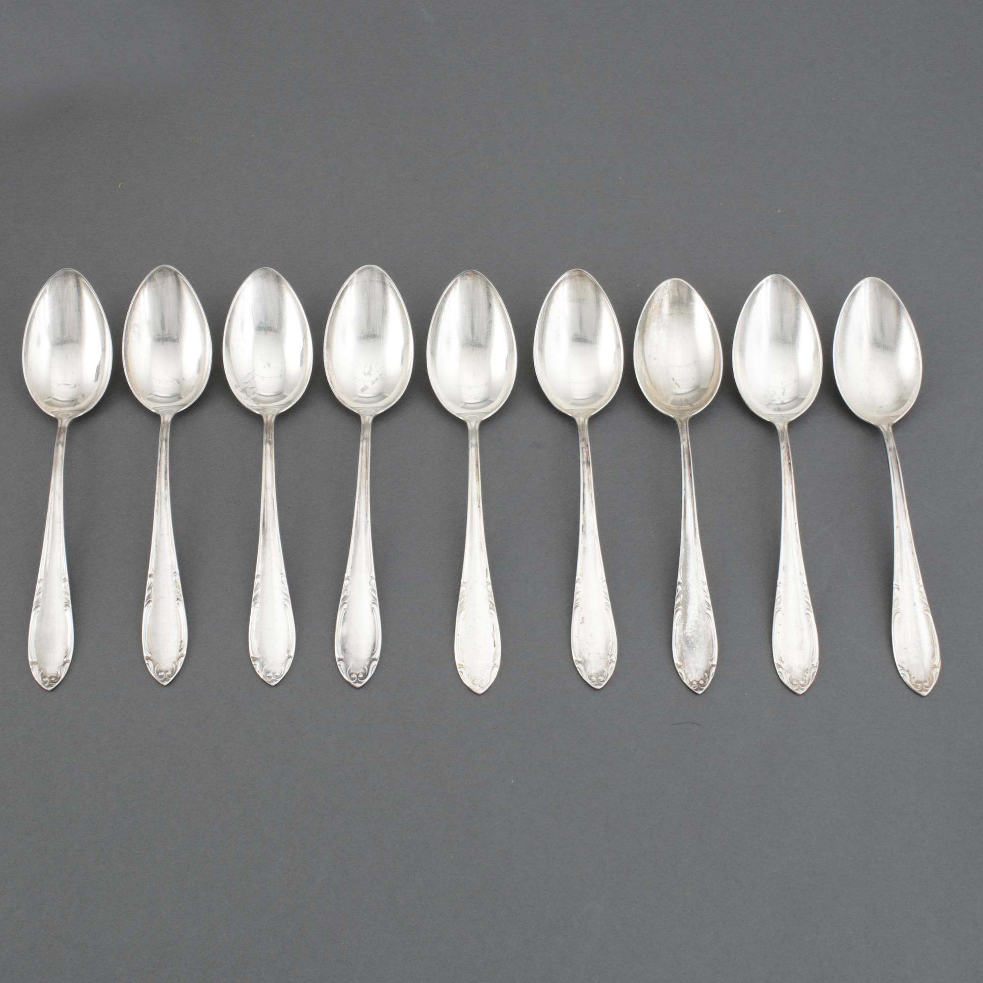Nine Swedish silver spoons, football memorabilia, 1947-1948 and five spoons, maker's mark CG Hallberg, Stockholm, 1947.