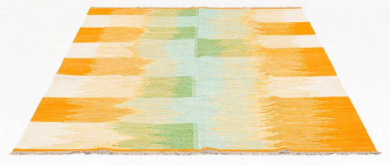 A Kilim rug, c. 242 x 170 cm.