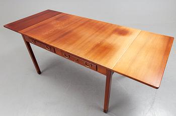 A mahogony desk by Nordiska Kompaniet, mid 20th century.