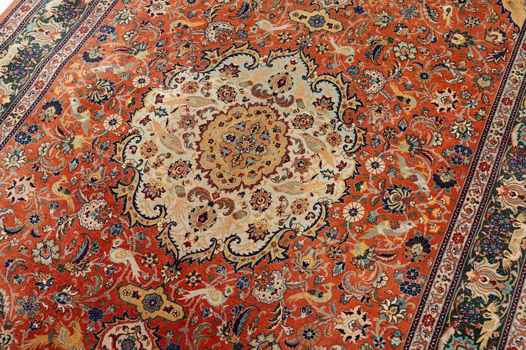 A part silk Tabriz carpet, c. 268 x 179 cm.