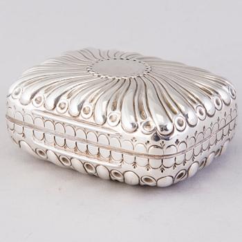 A hinged parcel-gilt soap case, London 1884.