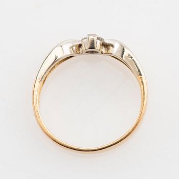 Ring 18K rött och vitt guld med en rund briljantslipad diamant, Raiteri & Carrero Valenza Italien.