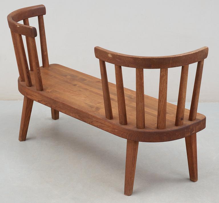 An Axel Einar Hjorth stained pine 'Utö' sofa, Nordiska Kompaniet, 1930's.