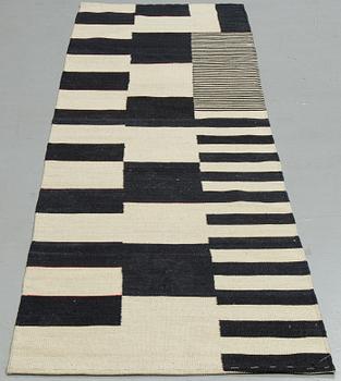 A runner, an Oriental kilim, ca 283 x 80,5-83 cm.