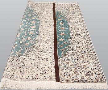 A Nain rug, part silk, so-called 6 LAA, approx. 239 x 160 cm.