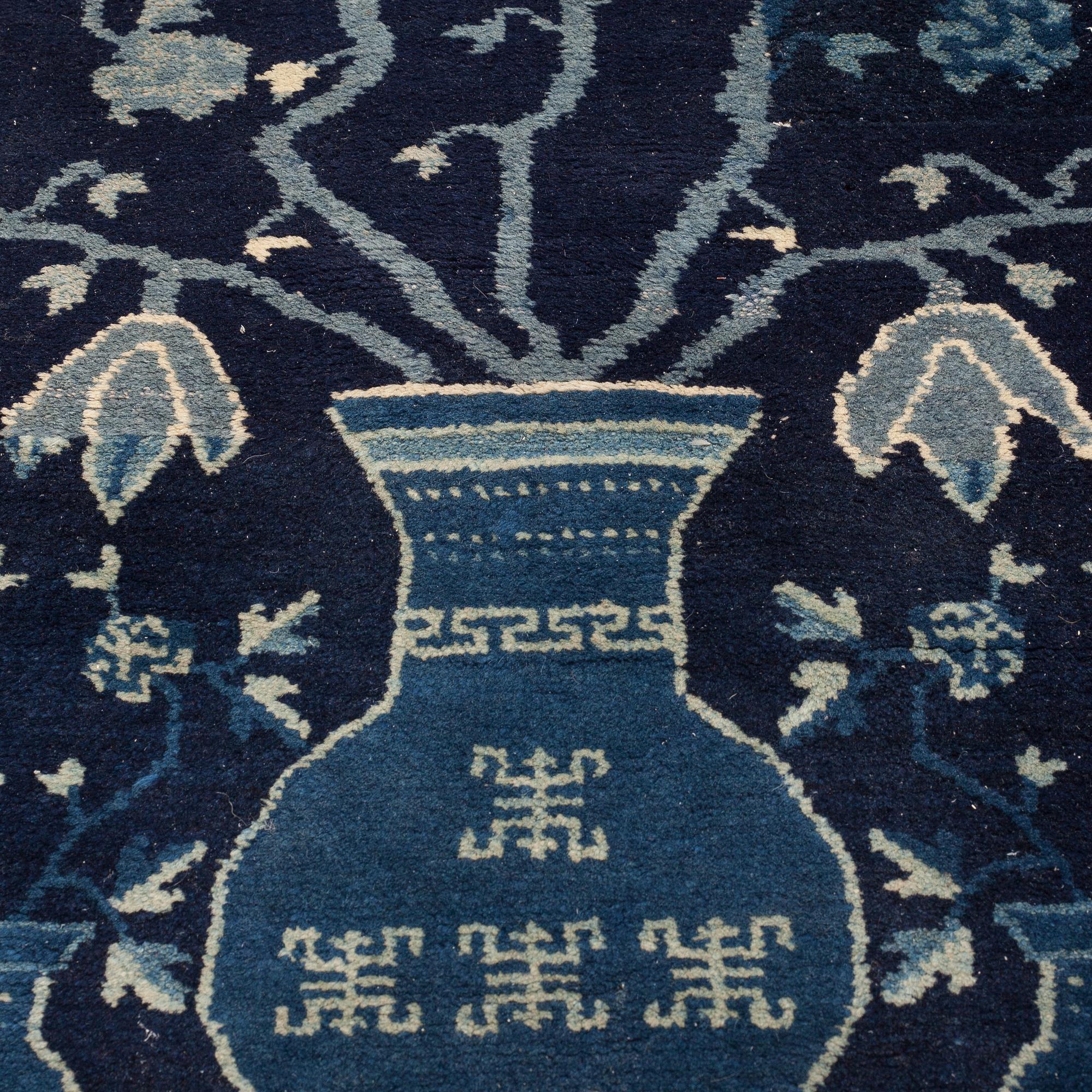 RUGS, 2 pieces, semi-antique Baotou, China, ca 110 x 58 and 111 x 60,5 cm.